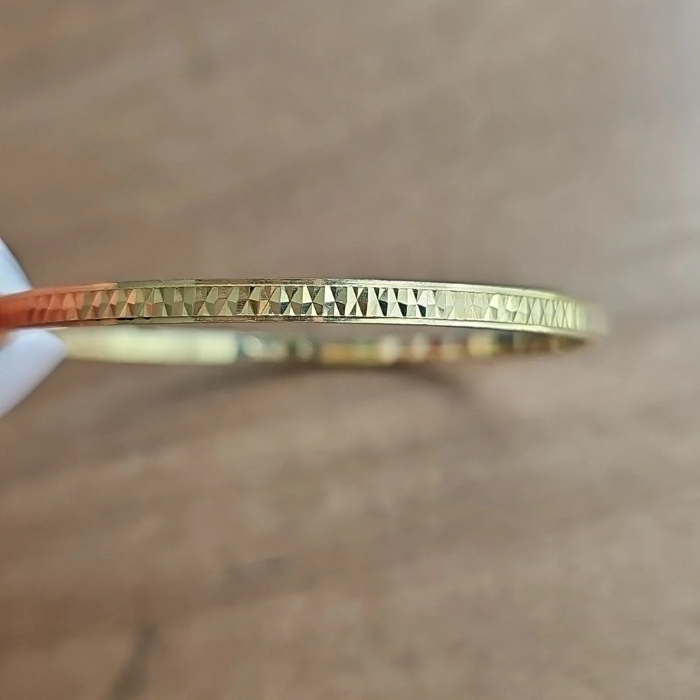 Trifari Elegant Gold Tone Bangle Bracelet